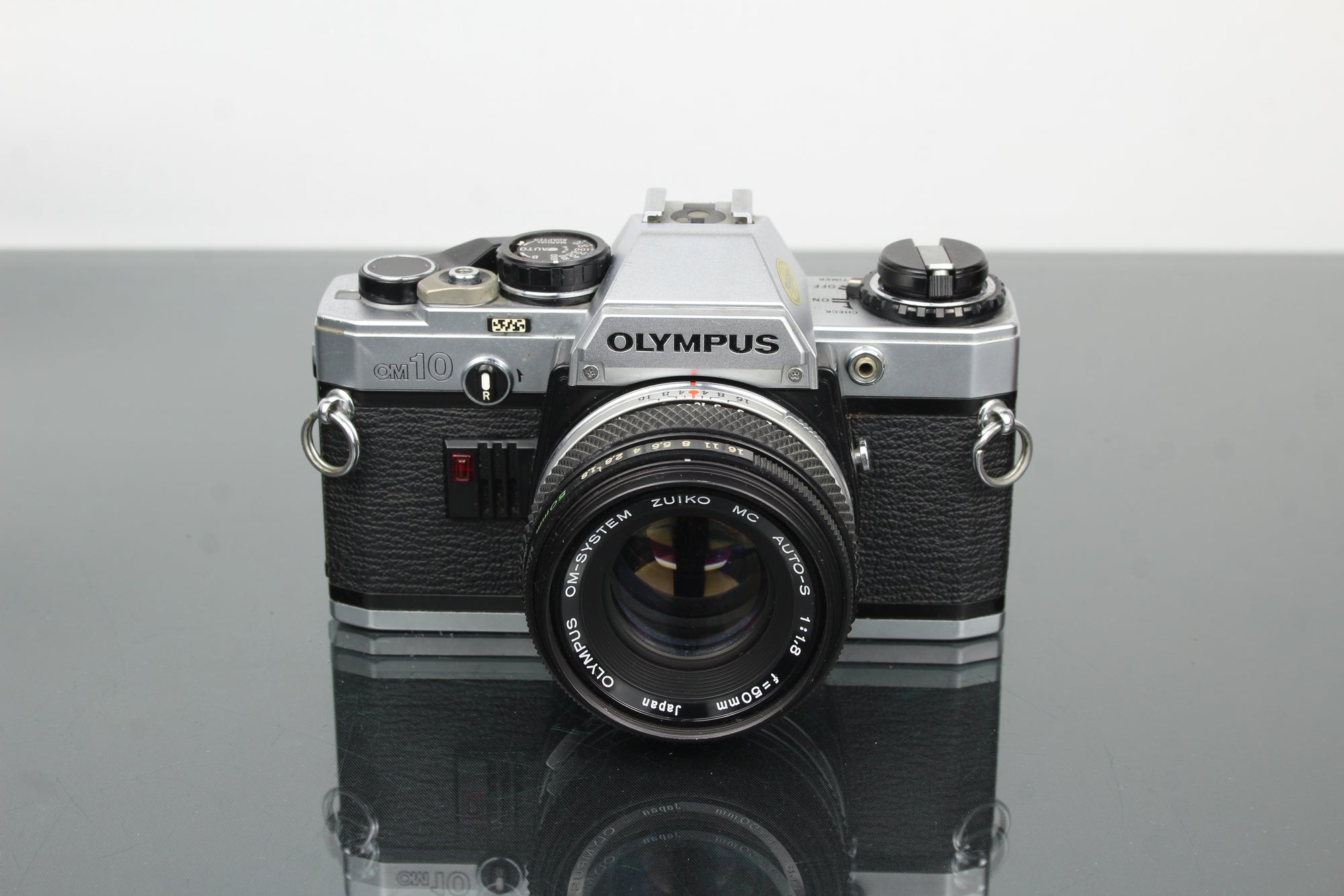 Olympus OM10 + Olympus 1:1.8 50mm lionsa