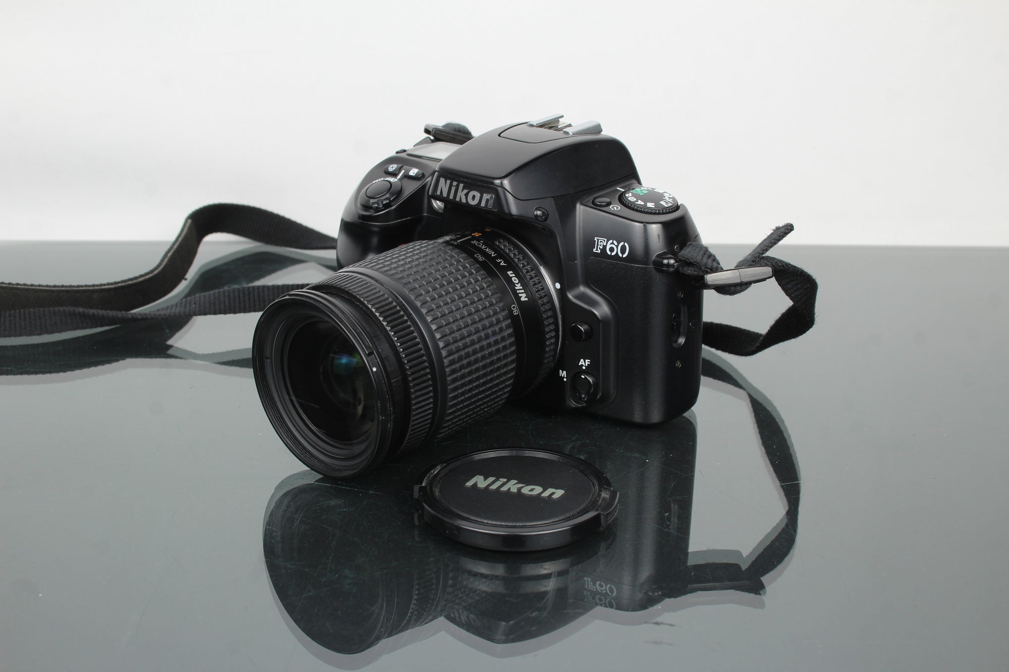 Nikon F60 + AF Nikkor 28-80mm 1:3.5-5.6 D lionsa
