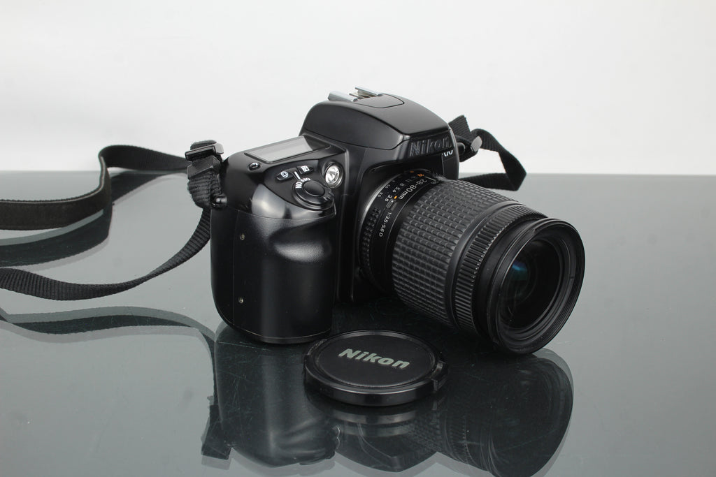 Nikon F60 + AF Nikkor 28-80mm 1:3.5-5.6 D lionsa