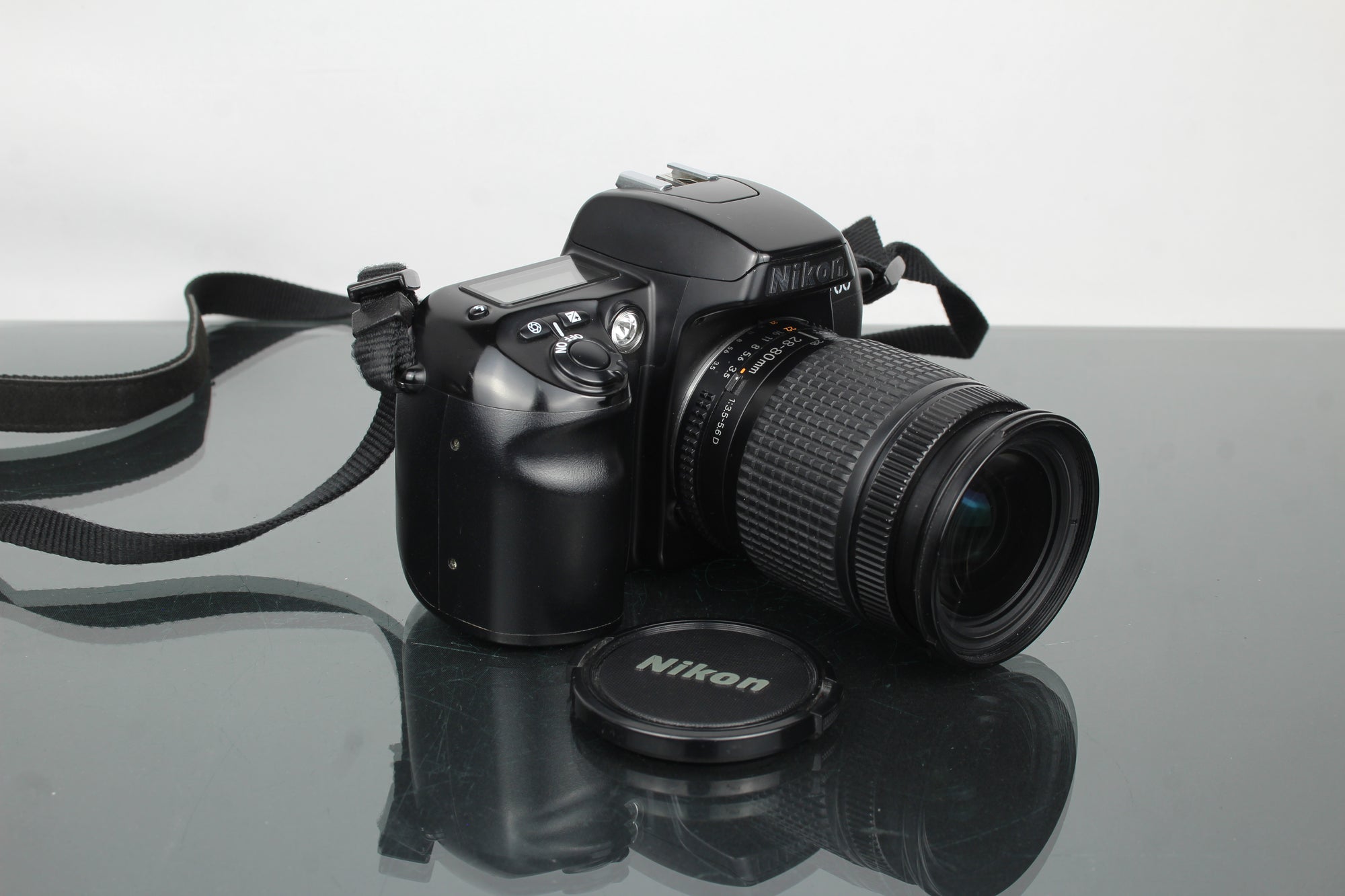 Nikon F60 + AF Nikkor 28-80mm 1:3.5-5.6 D lionsa