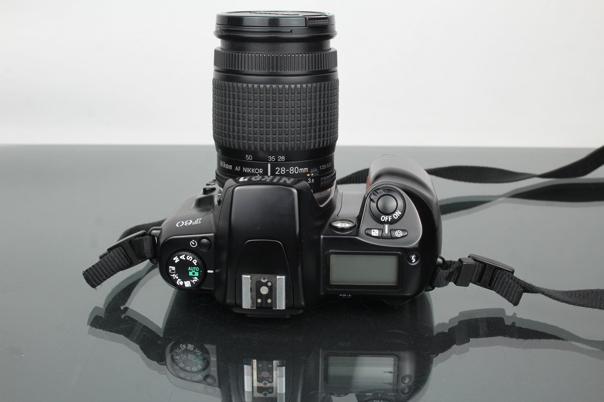 Nikon F60 + AF Nikkor 28-80mm 1:3.5-5.6 D lionsa