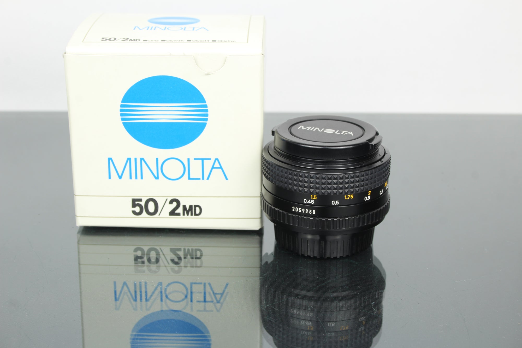 Minolta MD 50mm 1:2 49mm lionsa (súmha MD)