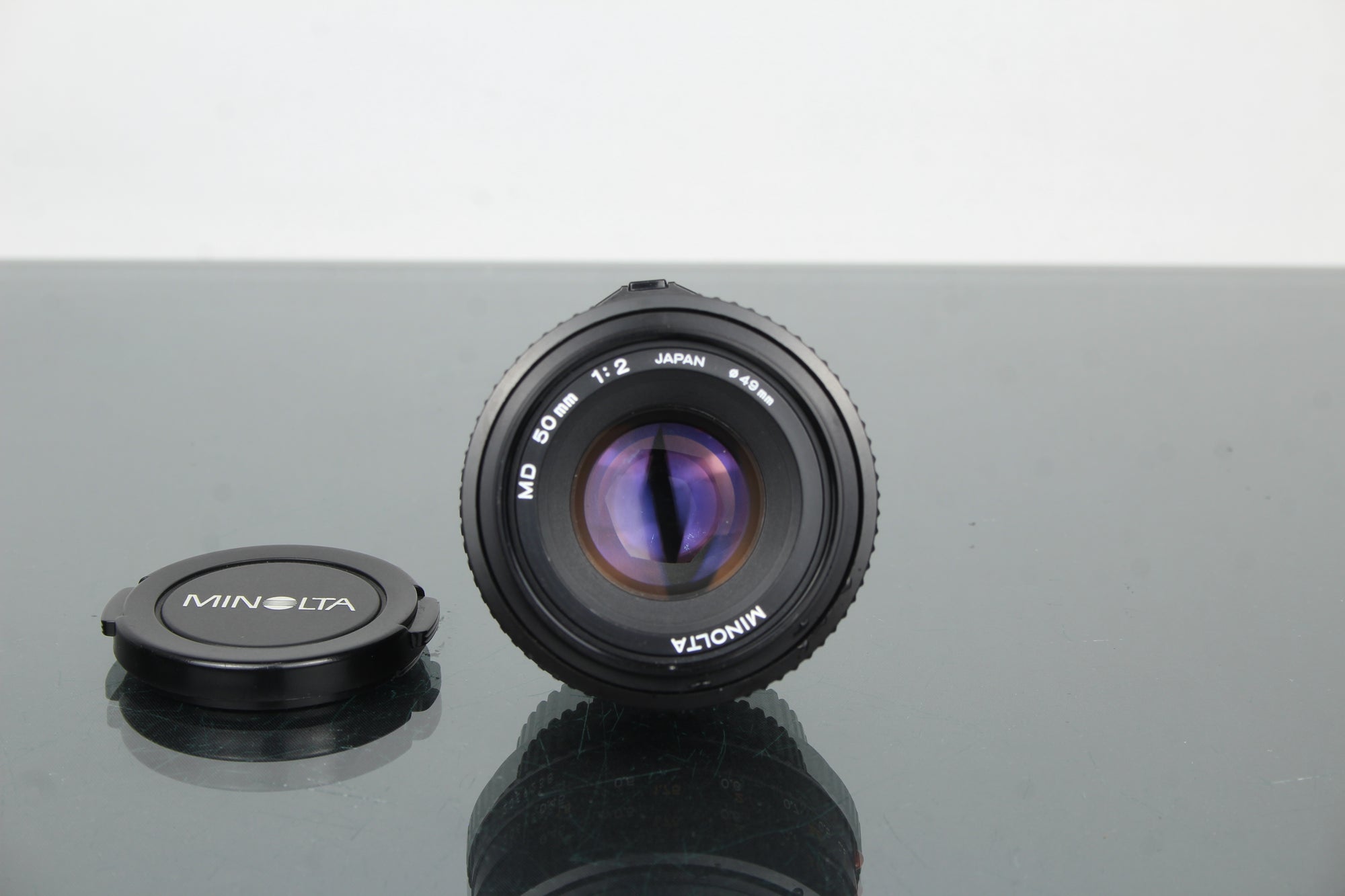 Minolta MD 50mm 1:2 49mm lionsa (súmha MD)