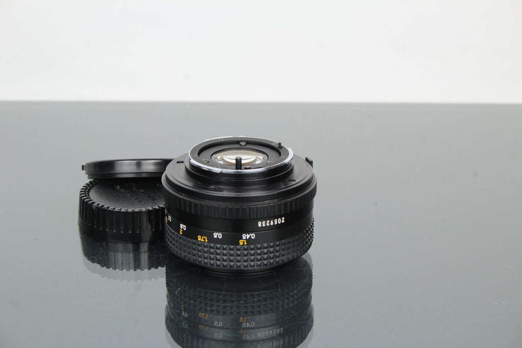 Minolta MD 50mm 1:2 49mm lionsa (súmha MD)