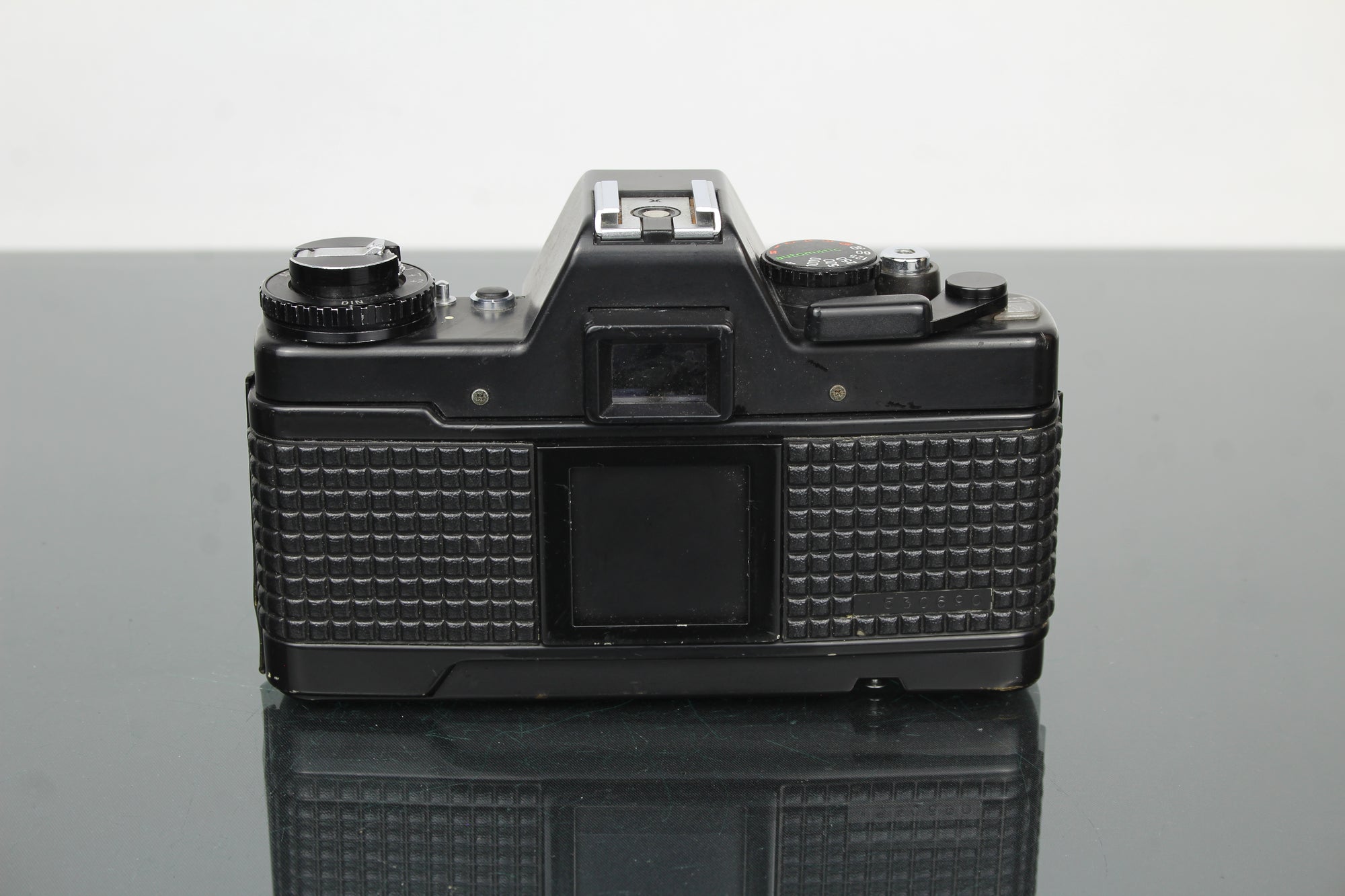 <tc>Praktica</tc> B200 leictreonach +  <tc>Praktica</tc>r 50mm 1.8 lionsa