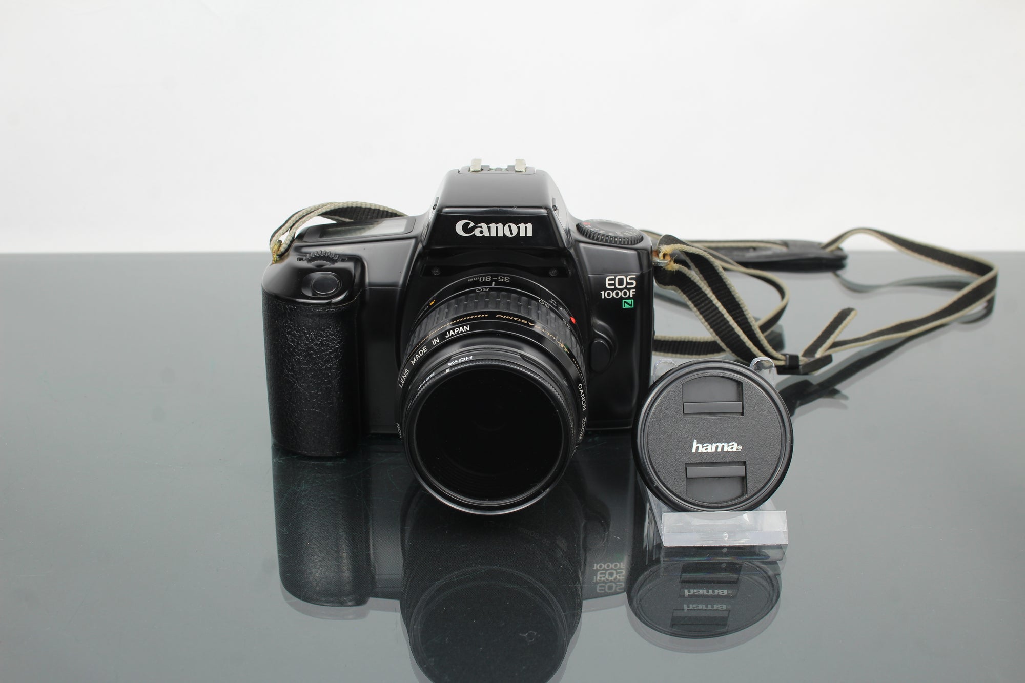 Canon EOS 1000f + 35-80mm 1:4-5.6 lionsa