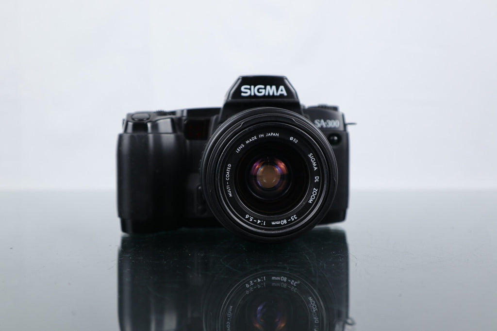 📷 Sigma SA - 300 | 35mm SLR Film Camera | Sigma DL Zoom 35 - 80mm 1:4 - 5.6 Lens - Dutch|Thrift