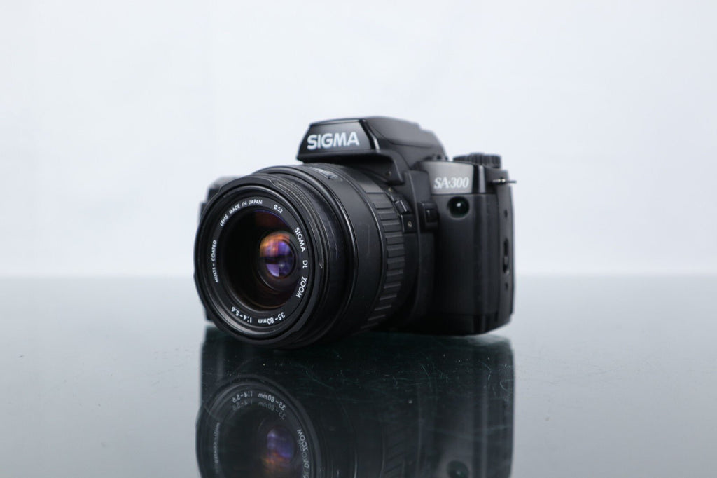 📷 Sigma SA - 300 | 35mm SLR Film Camera | Sigma DL Zoom 35 - 80mm 1:4 - 5.6 Lens - Dutch|Thrift